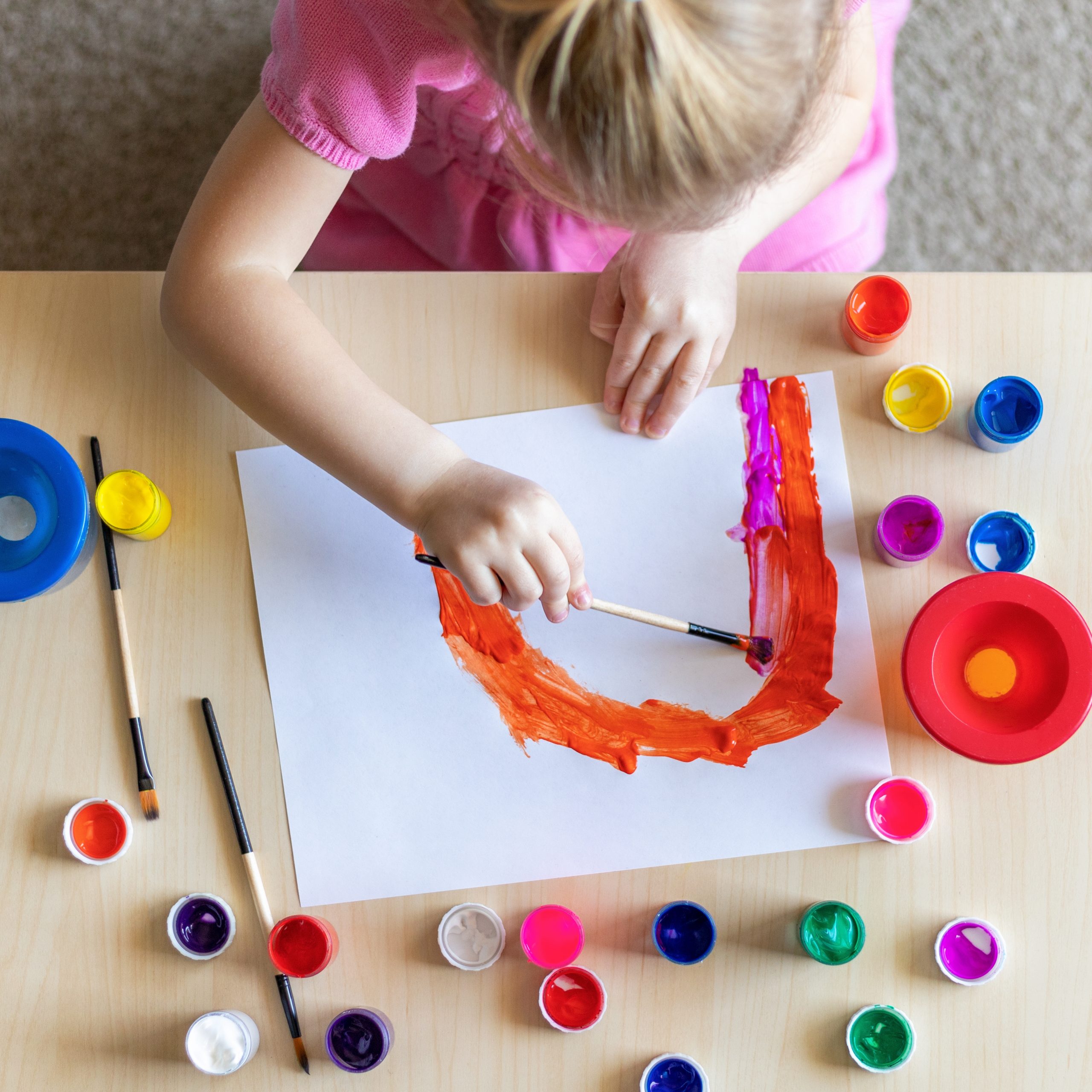 little girl painting rainbow on paper with colorfu 2025 01 08 09 23 49 utc scaled