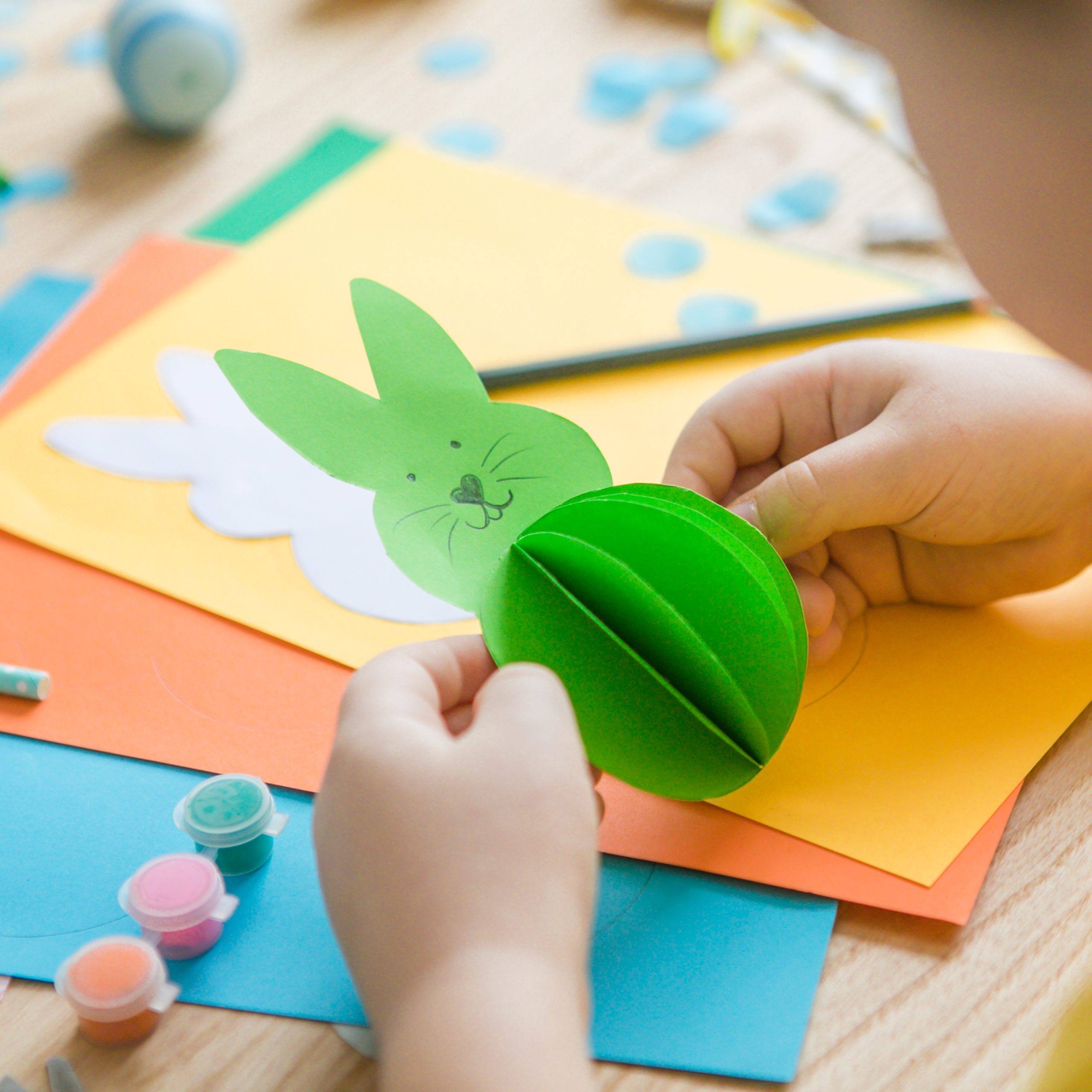 little kid boy holding bunny for easter greetings 2025 03 24 18 03 22 utc scaled